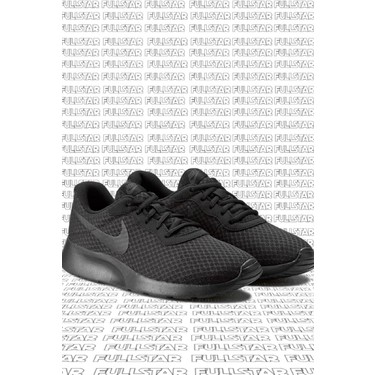 Nike tanjun black price hotsell