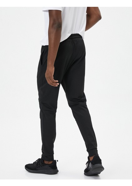 Jogger Spor Eşofman Altı Dikiş Detaylı Beli Bağcıklı Cepli fırsatları