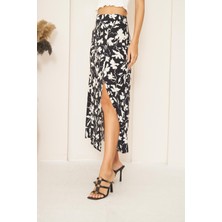Darlin Moda Siyah Yaprak Desenli Yırtmaçlı Midi Etek DM2014