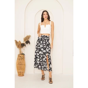 Darlin Moda Siyah Yaprak Desenli Yırtmaçlı Midi Etek DM2014