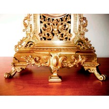 Tram56 Bronz Masa Saati. 19.y.y. Y:54 Cm. Taban: 35X15CM.