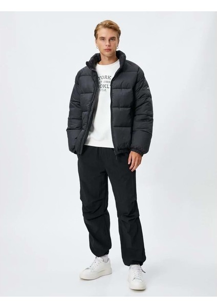 Şişme Mont Dik Yaka Fermuarlı Etiket Baskılı Cep Detaylı - Koton - 4WAM20063HW - Siyah - S fiyatları