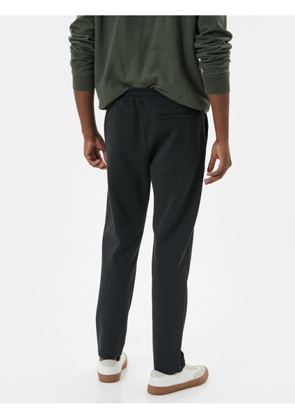 Beli Bağcıklı Pantolon Slim Fit Cep Detaylı Katlı Paça fırsatları