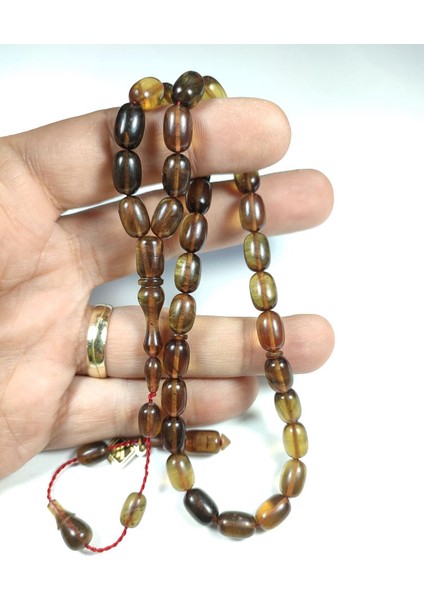 Iskeçeli Cemil Usta Işi Imzalı Ateş-I Kehribar Tesbih Sertifikalı No 3843 fırsatları