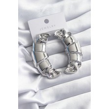 Clariss Pirinç Gümüş Renk Kruvasan Model Kadın Küpe