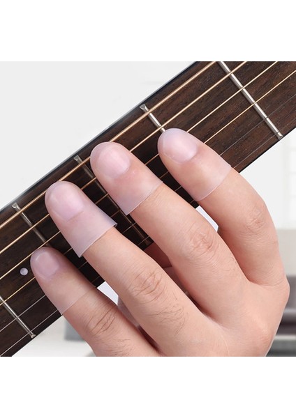 S Tarzı 4 Adet Ultra-Ince Sol El Gitar Parmak Koruyucu Silikon Parmak Koruyucu Kapak (Yurt Dışından) modelleri