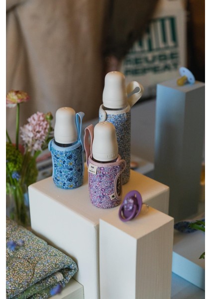 x Liberty Biberon Kılıfı Chamomile L.babyblue fırsatları