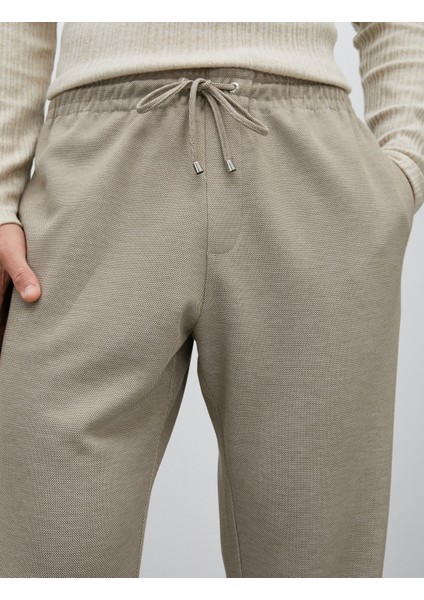 Beli Bağcıklı Pantolon Slim Fit Cep Detaylı indirimleri