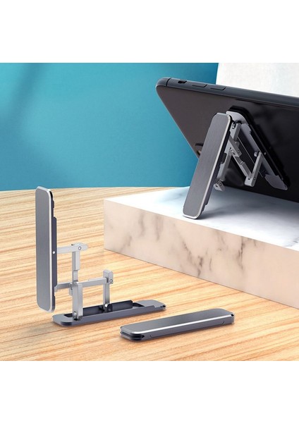 Siyah Stil 2022 Moda Ayarlanabilir Telefon Standı Üzerinde Evrensel Cep Telefonu Kendinden Yapışkanlı Katlanır Mini Metal Telefon Tutucu Braketi (Yurt Dışından) fiyatları