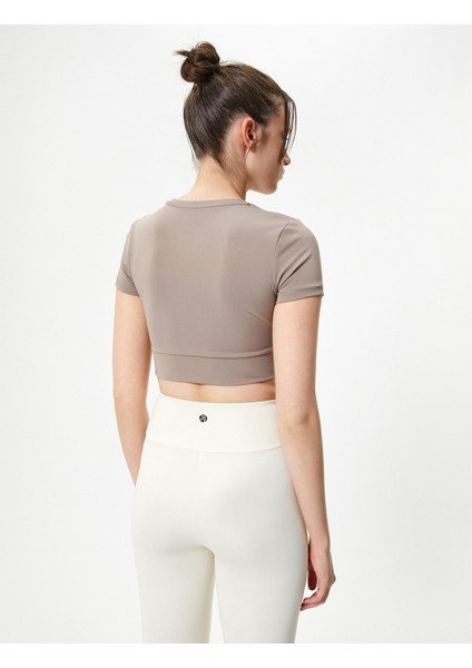 Spor Crop Tişört Kısa Kollu Bisiklet Yaka Asimetrik Kesim Slim Fit fırsatları