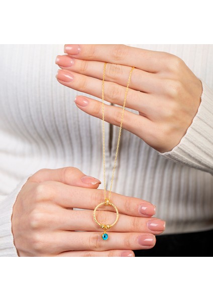 Beyaz Zirkon Taşlı Nazar Boncuğu Detaylı Dorika Top Süslemeli Gold Renk 925 Ayar Gümüş Kadın Kolye fırsatları