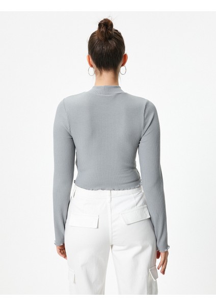 Dik Yaka Crop Tişört Asimetrik Kesim Uzun Kollu Yıldız Baskı Detaylı Ribanalı fırsatları