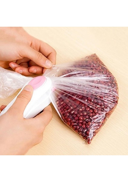 Beyaz Pembe Tarzı Taşınabilir Mini Isı Mühürleyen Ev Yapıştırma Makinesi Isı Mühürleyen Capper Gıda Tasarrufu Plastik Poşet Paketi Mini Aletler (Yurt Dışından) modelleri