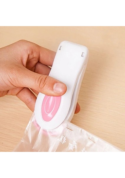 Beyaz Pembe Tarzı Taşınabilir Mini Isı Mühürleyen Ev Yapıştırma Makinesi Isı Mühürleyen Capper Gıda Tasarrufu Plastik Poşet Paketi Mini Aletler (Yurt Dışından) fırsatları