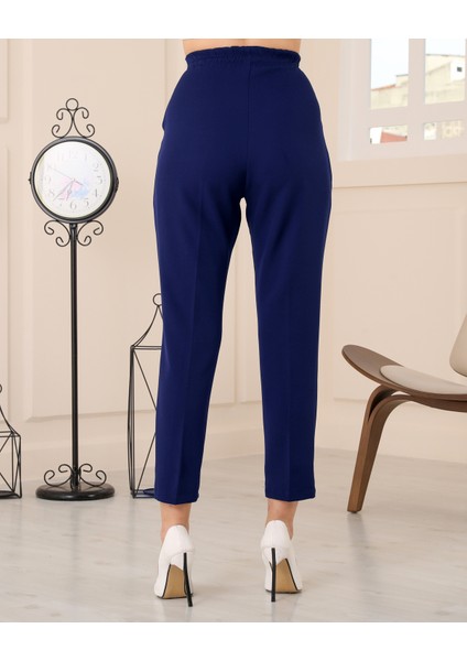 Kadın Tek Taraf Kemer Detaylı Arka Bel Kısmı Lastikli Önden Çift Pileli Yüksek Bel Cepli Havuç Kumaş Pantolon - Lacivert fiyatları