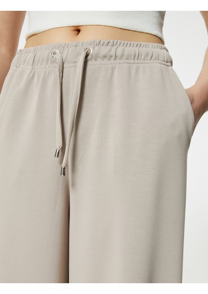 Culotte Pantolon Beli Bağcıklı Crop Bol Paça Cepli Modal Karışımlı indirimleri