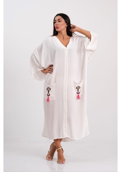 Kadın Beyaz V Yaka Cepleri ve Sırtı Otantik Nakışlı Püsküllü Oversize Uzun Gömlek Elbise fiyatları