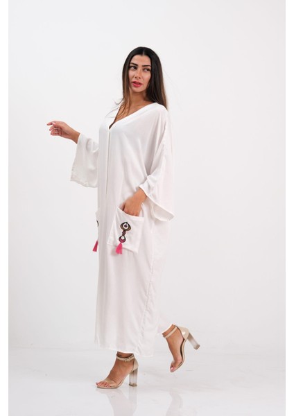 Kadın Beyaz V Yaka Cepleri ve Sırtı Otantik Nakışlı Püsküllü Oversize Uzun Gömlek Elbise fırsatları