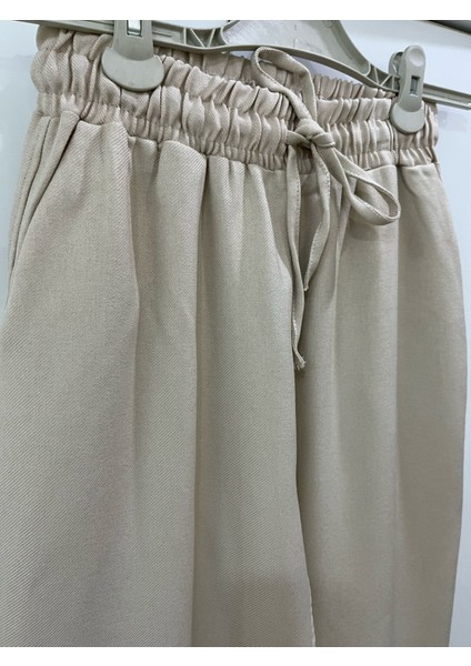Kadın Paçaları ve Beli Lastikli Şık Pantolon modelleri
