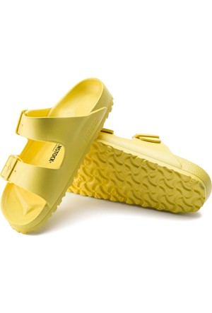 yellow and white birkenstocks