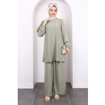 İmaj Butik Kadın Çağla Renkli Tunik Pantolonlu Takım Dokuma Kumaş ile Modern Stil Sunuyor