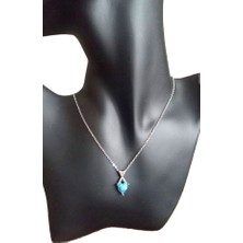 Turuncu Store Çapraz Gökkusagi Çelik Kolye TRC3607