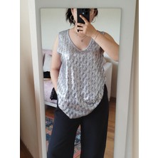 Butik Swordlion Kosuz V  Yakalı  Pulpaletli Bluz