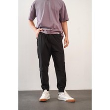 Erkek Relax Fit Kalıp Beli ve Paçası Lastikli Jogger Pantolon