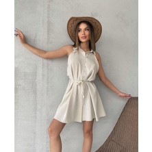 Nidi Store Taş Rengi Reglan Kol Bebe Yaka Önü Düğmeli Mini Elbise