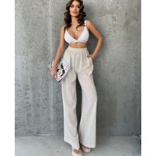 Nidi Store Bej Beli Lastikli Iç Gösteren Çok Geniş Paça Gofre Pantolon