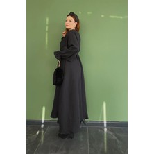 Çiğdem Sonkur Kol Ucu ve Beli Lastikli Siyah Maxi Boy Bisiklet Yaka Elbise