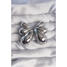 Clariss Pirinç Gümüş Renk Iri Bombeli Kelebek Küpe