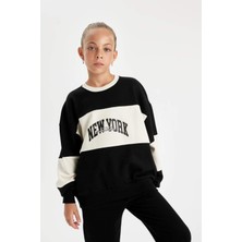 DeFacto Kız Çocuk Siyah Oversize Geniş Kalıp Bisiklet Yaka Baskılı Sweatshirt D1105A824AU