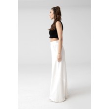 Deseo Boutique Kadın (Astarsız -Hafif Iç Gösterir) Ekru Renk Asimetrik Kup Detaylı Geniş Paça Örme Pantolon
