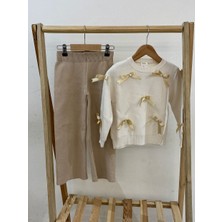 Kız Krem Fiyonk Desenli Triko Takım