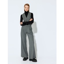 Koton x Şahika Ercümen - Cepli Pile Detaylı Geniş Paça Kumaş Pantolon
