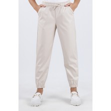 Beli ve Paçası Lastikli Cepli Deri Görünümlü Kız Çocuk Pantolon