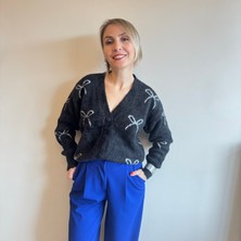 Siyah Fiyonk Desenli Yumoş Hırka