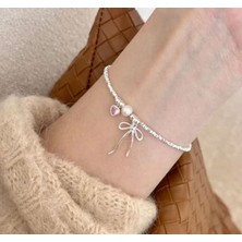 Harlofia Jewelry Çelik Kurdele Detaylı Fiyonk Kalp Bileklik