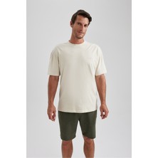 DeFacto %100 Pamuk Oversize Geniş Kalıp Bisiklet Yaka Basic Düz Kısa Kollu Tişört B0662AXNS