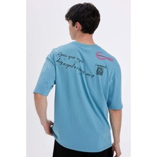 DeFacto Oversize Geniş Kalıp Bisiklet Yaka Sırt Baskılı Kısa Kollu Tişört C4084AX24SM