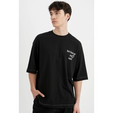 DeFacto Loose Fit Bisiklet Yaka Sırt Baskılı Kısa Kollu Tişört C2244AX24SM