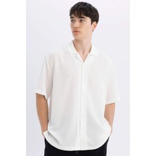 DeFacto Relax Fit Yazlık Polo Yaka Krinkıl Kumaş Kısa Kollu Beyaz Gömlek C7398AX24SM