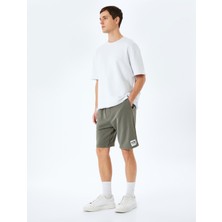 Koton Cepli Etiket Detaylı Pamuk Karışımlı Beli Bağcıklı Şort