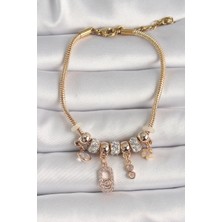 Clariss 316L Çelik Gold Renk Zincir Sallantı Zirkon Taşlı Messika Figür Yıldız Detay Kadın Bileklik