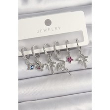 Clariss Pirinç Gümüş Renk Sallantı Zirkon Taşlı Deve Kuşu Figür Çoklu Kadın Küpe Seti