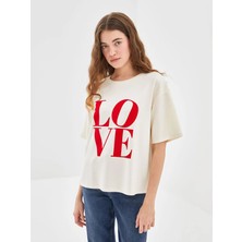 LC Waikiki Lc Waikikilcw Vision Ekru Bisiklet Yaka Baskılı Oversize Kadın Tişört T T
