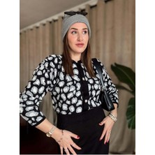 Leopar Desenli Şıklık: Siyah Triko Hırka