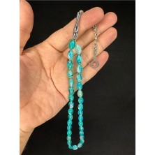 Anemore Collection TOZ KEHRİBAR TESBİH SİMLİ TURKUAZ RENKLİ BEYZİ KESİM 10MMX6,5MM T-678
