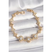 Clariss Pirinç Gold Renk Zirkon Taşlı Yonca Model Kadın Bileklik